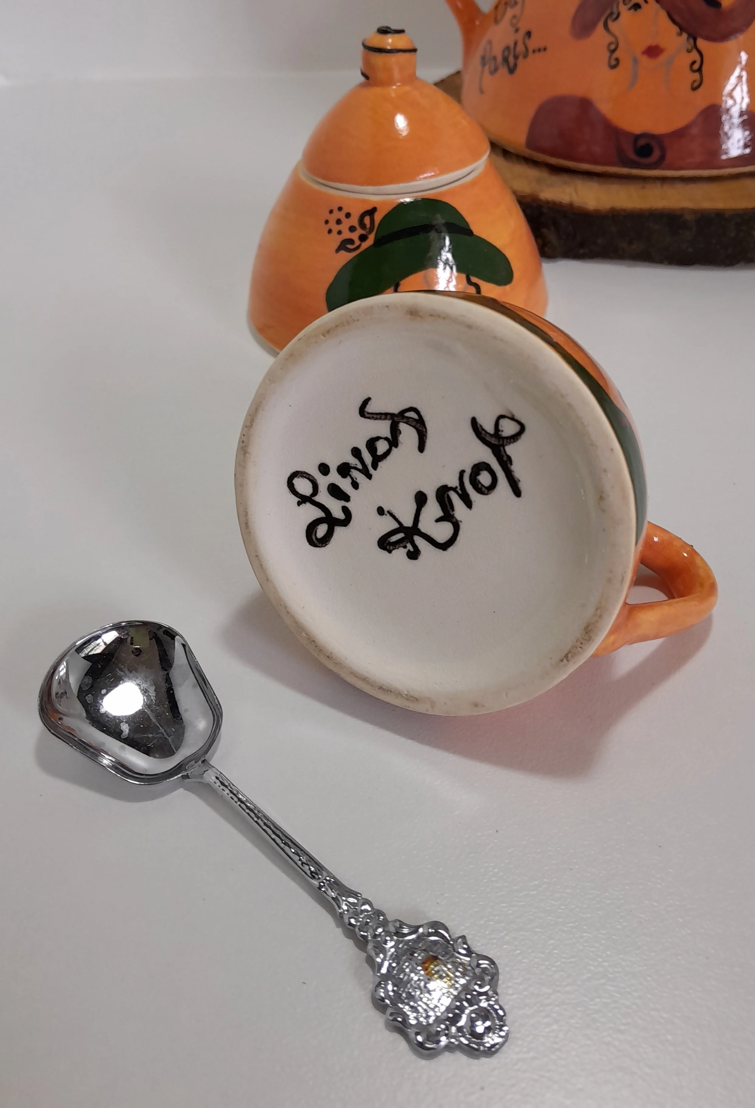 3 Piece Hand-painted Glazed Pottery Tea Set in a Vibrant Orange Colour with Black Trim on Finials and Including a Silver Coloured Sugar Spoon - Image 7